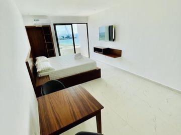 DEPARTAMENTO EN VENTA CON VISTA AL MAR EN PUERTO MORELOS CON ROOFTOP/ALBERCA
