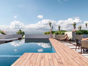 Lujoso departamento a pie de playa de 3 habitaciones y 3 baños en Mahahual