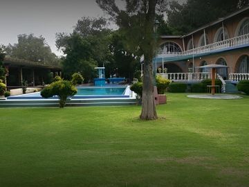 HACIENDA CON ACTIVIDAD DE BALNEARIO Y HOTEL, SUPERFICIE 20,200 MTS