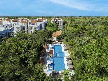 Departamento en venta en Puerto Morelos de 2 habitaciones a 10 minutos de la playa