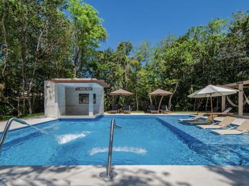 Departamento en venta en Puerto Morelos de 2 habitaciones a 10 minutos de la playa