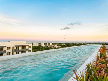 Departamento en Cancún con rooftop y alberca olímpica