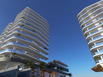 DEPARTAMENTO DE 3 HABITACIONES FRENTE AL MAR Y CLUB DE PLAYA EN COSTA MUJERES