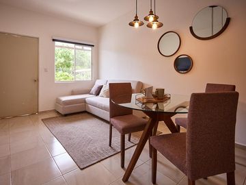 Departamento en venta en Playa de Carmen con 2 recamaras en fraccionamiento exclusivo