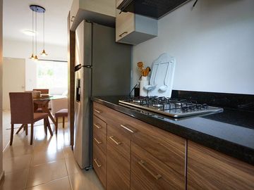 Departamento en venta en Playa de Carmen con 2 recamaras en fraccionamiento exclusivo