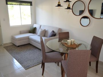 Departamento en venta en Playa de Carmen con 2 recamaras en fraccionamiento exclusivo