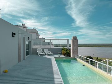 Departamento de 3 dormitorios más comodín, vista al río y amenities