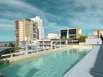 Departamento de 3 dormitorios más comodín, vista al río y amenities