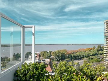 Departamento de 3 dormitorios más comodín, vista al río y amenities
