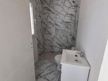 Casa de 2 ambientes con cochera en venta en complejo Arturo Illia - Grand Bourg