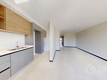 Venta, departamento a estrenar de 2 amb con cochera, zona chauvin.