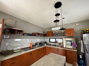 Casa de 2 recamaras con amplio jardín y piscina de una planta en Cholul.