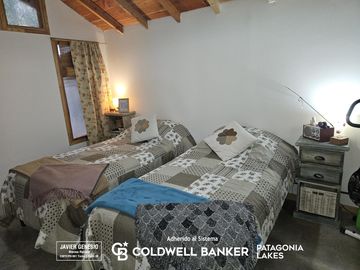 VENTA Casa   departamento 3 dormitorios 135m2, lote 1138m2, Barrio Norte, Villa la Angostura