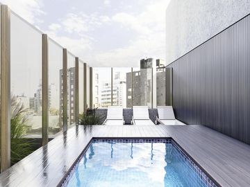 DEPARTAMENTO PREMIUM DE TRES DORMITORIOS EN SUITE VENTA PISCINA CENTRO ROSARIO