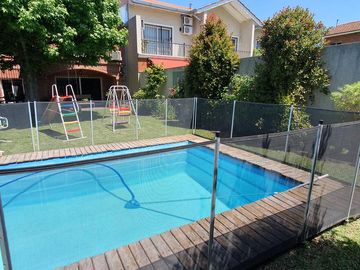 Espectacular Residencia con Amplio Jardín y Piscina en Zona Residencial - En venta