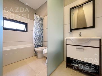 VENTA  con renta - Departamento 3 amb con jardín en  Espacio las cavas, Canning