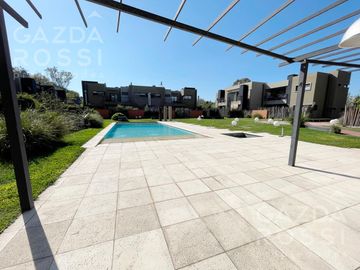 VENTA  con renta - Departamento 3 amb con jardín en  Espacio las cavas, Canning