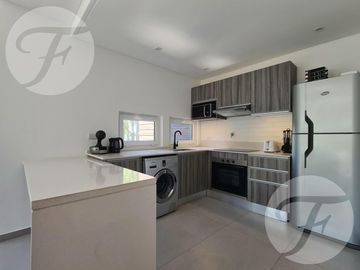 Venta en Renata Norte Pinamar I Departamento de un dormitorio en suite con cochera - Permuta