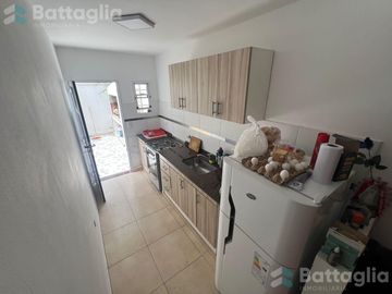 Departamento en planta baja con parrilla y cochera en San Bernardo