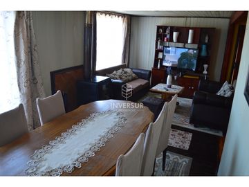 PROPIEDAD CON 2 CASAS AV PRINCIPAL RIO BUENO