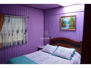 PROPIEDAD CON 2 CASAS AV PRINCIPAL RIO BUENO