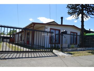 PROPIEDAD CON 2 CASAS AV PRINCIPAL RIO BUENO