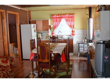 PROPIEDAD CON 2 CASAS AV PRINCIPAL RIO BUENO