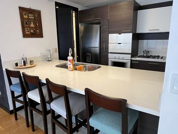 VENTA AMPLIA SUITE CON PATIO - QUITEÑO LIBRE - BELLAVISTA