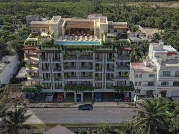 * Departamento en venta en Puerto Morelos, frente al mar
