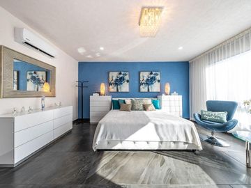 En venta: Casa Moderna en Residencial Valenia, Playa del Carmen
