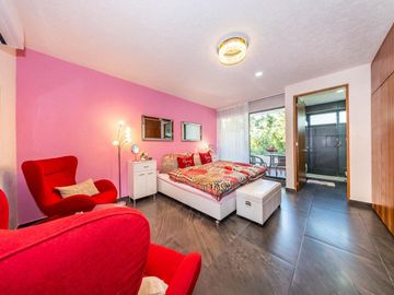 En venta: Casa Moderna en Residencial Valenia, Playa del Carmen
