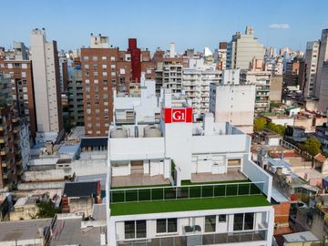 DEPARTAMENTO DE DOS DORMITORIOS VENTA PATIO EXCLUSIVO CENTRO ROSARIO