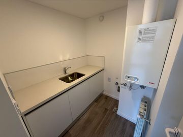 DEPARTAMENTO DE DOS DORMITORIOS VENTA PATIO EXCLUSIVO CENTRO ROSARIO