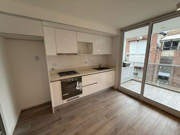 DEPARTAMENTO DE DOS DORMITORIOS VENTA PATIO EXCLUSIVO CENTRO ROSARIO