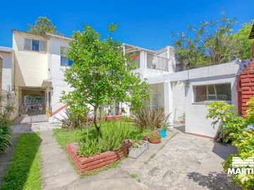 Casa multifamiliar con dos locales - San Isidro