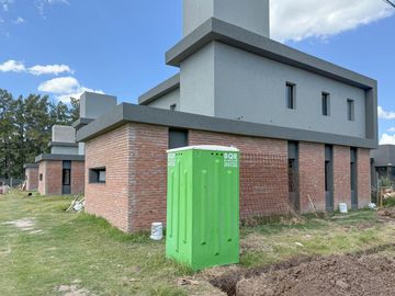 casa premium dos dormitorios patio parrillero condominios tierra de sueños 3 roldan