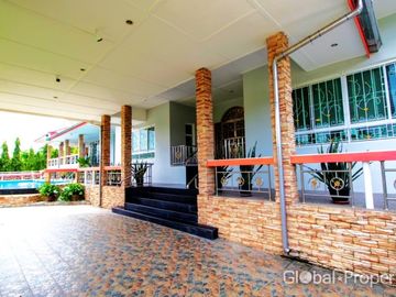 Luxury pool villa on a spacious land plot with mountain views