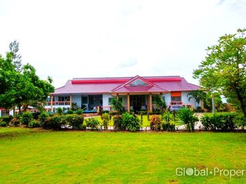 Luxury pool villa on a spacious land plot with mountain views