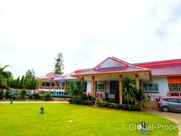 Luxury pool villa on a spacious land plot with mountain views