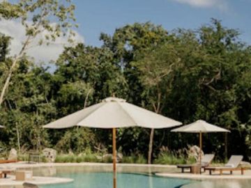 VENTA DE LUJOSO DEPARTAMENTO A 5 MIN DE PLAYA DEL CARMEN