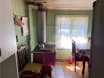 CASA CON AMPLIO TERRENO AL LADO TERMINAL DE BUSES RIO BUENO