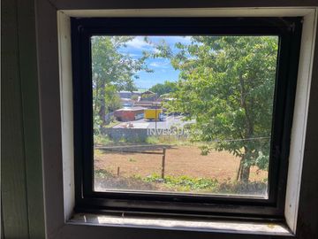 CASA CON AMPLIO TERRENO AL LADO TERMINAL DE BUSES RIO BUENO
