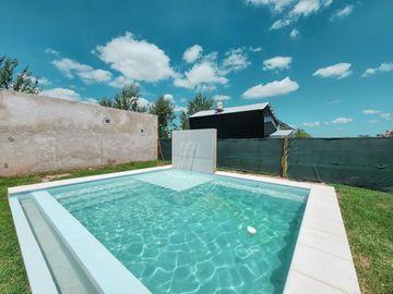 Casa de 2 dormitorios con jardín y pileta en Tierra de Sueños 3, sector A