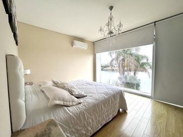 Los Alisos  casa con 4 dormitorios al agua en Nordelta, alquiler con muebles. Anual o temporal.