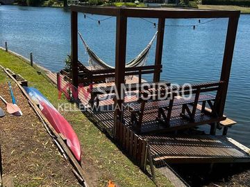 Los Alisos  casa con 4 dormitorios al agua en Nordelta, alquiler con muebles. Anual o temporal.