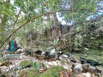 VENDO CASA Y TERRENO DE 1856M2 BORDEADO X RIO EN BOQUERON