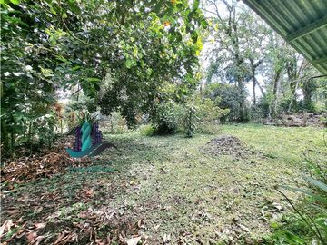 VENDO CASA Y TERRENO DE 1856M2 BORDEADO X RIO EN BOQUERON