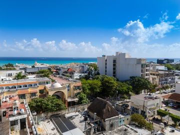 Departamento AMUEBLADO en Venta en Playa del Carmen. Estudio Mezzanine, Rooftop con vista al mar!