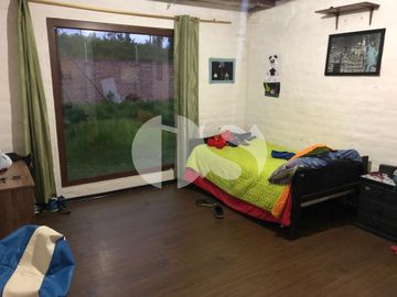 SE VENDE TERRENO CON CASA EN RIOBAMBA SECTOR QUINTUL