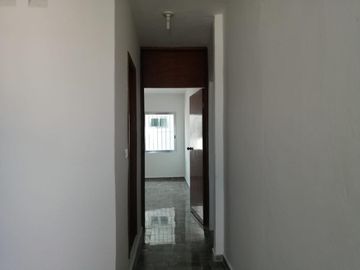 Edificio con dos departamentos y un local comercial en planta baja. En venta - (3)